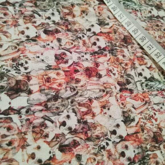 Fabrics with optical illusion pattern featuring dog heads - Picture 2 of 3